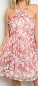 Pink floral halter dress. Size medium. New.